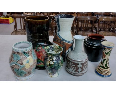 Collection of art pottery to include: Bourne Denby stoneware relief decorated floral and foliate vase, a brown, black and cre