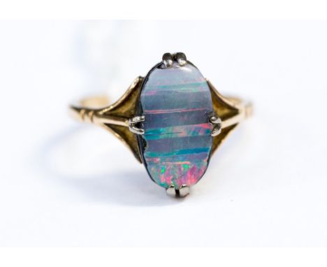 A 9ct opal doublet claw set ring, ring size approx K 1/2