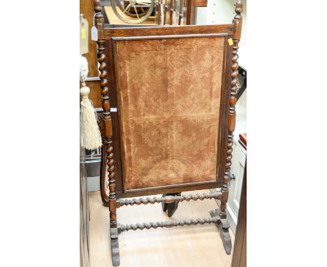 A 19th Century firescreen, the sides with barley twist uprights