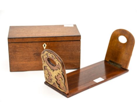 A walnut and brass book slide, a George III oak and ebony strung tea caddy 