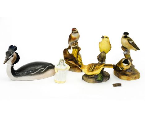 A Royal Copenhagen model of a Grebe (3263), a Royal Worcester candle snuffer 'French Cook' and three Royal Worcester double g