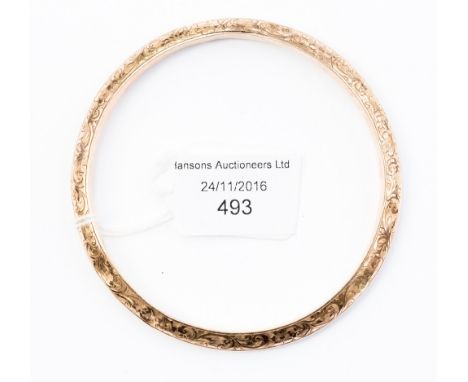 A Victorian rose gold large cuff bangle, engraved floral pattern, 90 mm diameter approx, 11.8 grams approx 