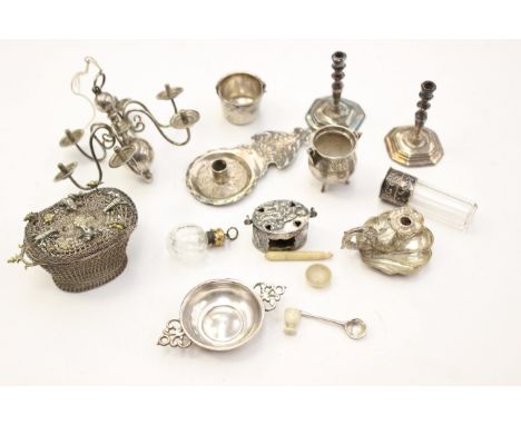 A collection of Continental white metal miniature items to include chamber stick, lobster basket, candle sticks, bucket, caul