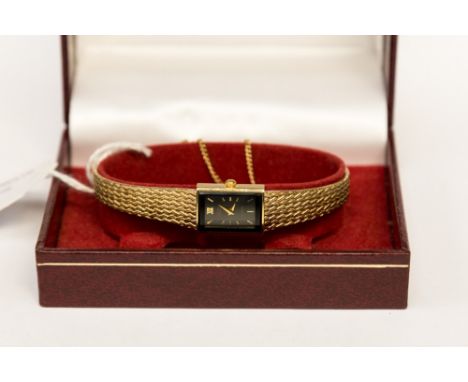 A ladies Rotary gold plated bracelet watch, with black dial and baton numerals (original case) 