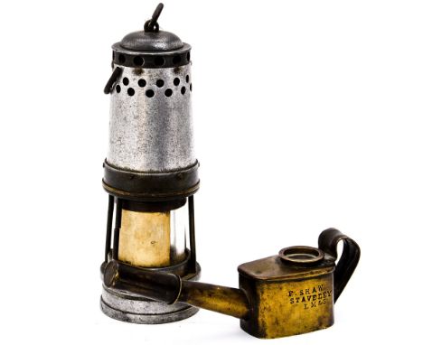 An all brass LMS railway engine drivers inspection oil lamp. Marked to side ""F Shaw, Staveley, L M & S.". Together with a Mi