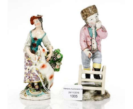 A Continental figure of boy at a gate with a Derby figure of a Shepherdess with sheep 