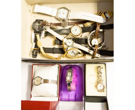 A box of wristwatches, including Accurist, Timex, etc, some in original boxes 
