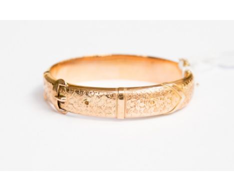 A 9ct gold hinged buckle bangle, 16.2 grams approx 