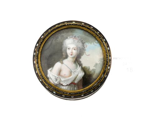 A George III tortoiseshell circular lidded box, the cover inset with a watercolour portrait of a classically draped semi nude