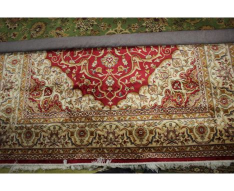 Red ground Keshan carpet, 280cm x 200cm.