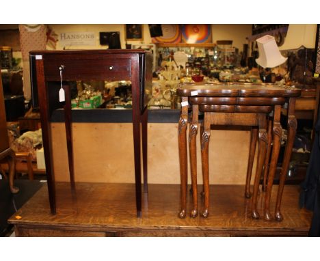 An early 20th Century oak sofa table, fitted with a single drawer, together with a nest of three tables, (2)