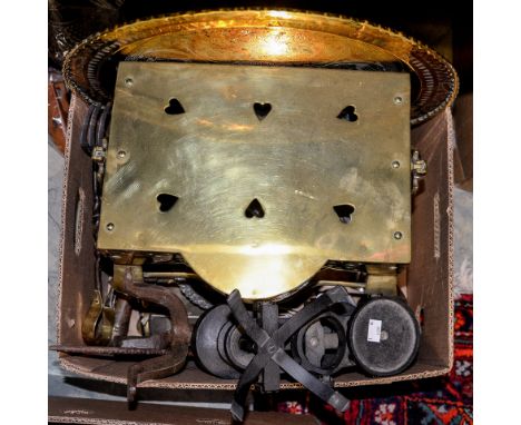 A box of metalware, to include a fireside brass trivet, Victory weighing scales and graduated weights, brass wall hanging, et