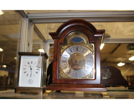 A modern Matthew Norman of London carriage clock, Swiss made movement, gong strike, height 13.5 cm approx; together with a re