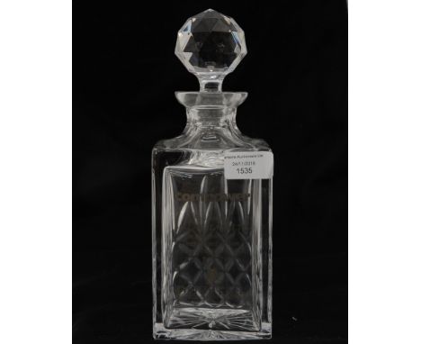 A square cut glass decanter 