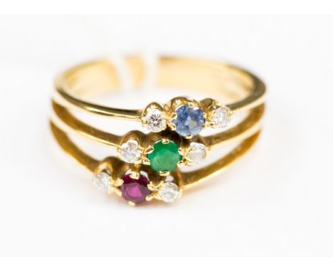 A ruby, emerald, sapphire and diamond set three band 18ct gold ring, ring size M, gross weight approx 3.9 grams