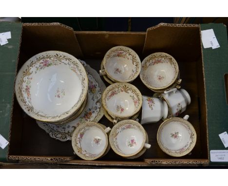 A Rockingham style part tea set, comprising bread and butter plate,slop bowl six saucers and fourteen cups of two sizes 