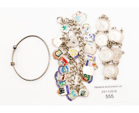 A silver charm bracelet (enamelled crests) and a silver sixpence bracelet pre 1947 together with a child's silver bangle 