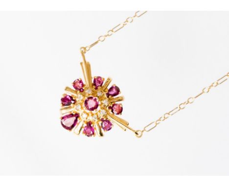 A 14ct 0.585 ruby and diamond pendant and chain gross weight 4.7 grams approx 