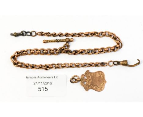 A 9ct rose gold Albert of curb links together with a 9ct shield medallion total weight approx .24 grams 