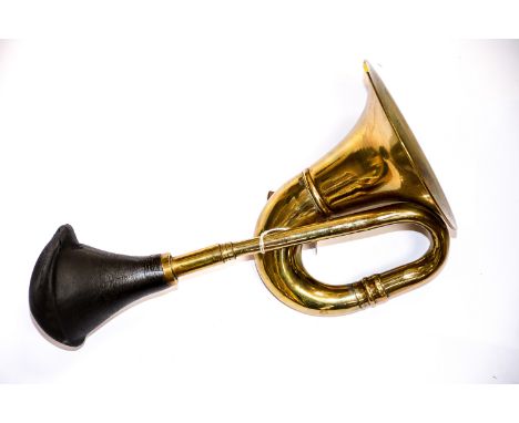 A vintage brass car horn, rubber perished 