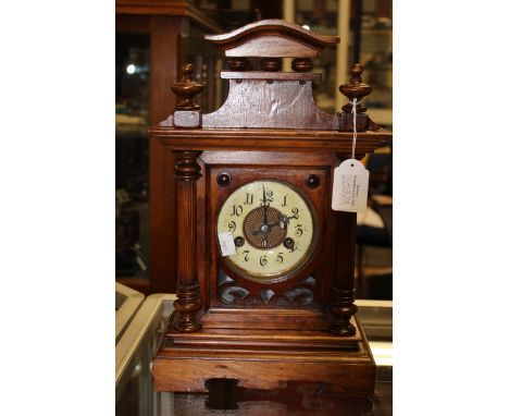 A 19th Century mantle clock, enamelled dial 