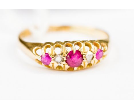 An 18ct gold, ruby and diamond ring, size Q½, 2.1 grams approx 