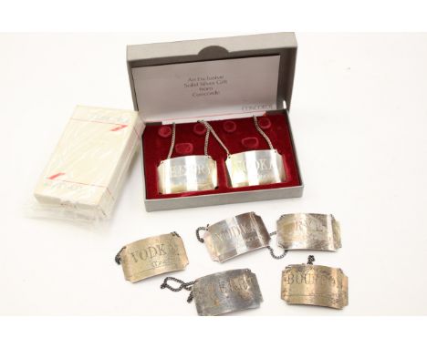 A cased Concorde commemorative 10th Anniversary silver Sherry and Vodka decanter labels, with five further Concorde silver de