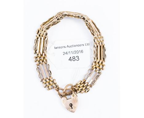 A 9ct rose gold gate bracelet of alternate polished and textured links with padlock clasp, approx 18 grams 