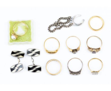 Eight assorted gold rings, a pair of Art Deco silver and enamel sleeve links and a horseshoe pendant 