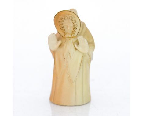 A Royal Worcester candle snuffer 