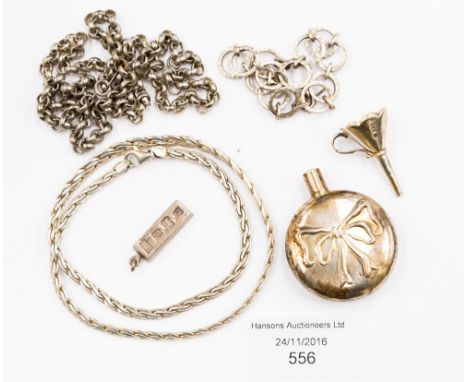 A collection of silver jewellery to include perfume bottle and funnel, necklaces, bracelet and small ingot, 2.62 ozt/81.5 gra