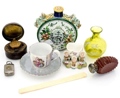A travelling leather cased inkwell, a vinaigrette, an agate glass Victorian scent bottle, an Italian majolica liqueur bottle,