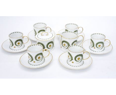 A Susie Cooper bone china 'Assyrian Motif' pattern coffee service, comprising six cups, six saucers, cream and covered sugar 