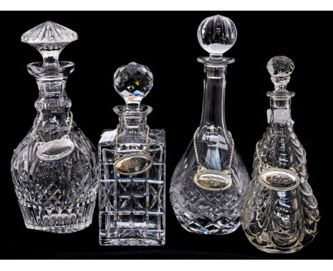 Cut glass decanters, mid 20th Century, possibly Stourbridge, to include Whisky and two Sherry with wine/spirit labels and a m