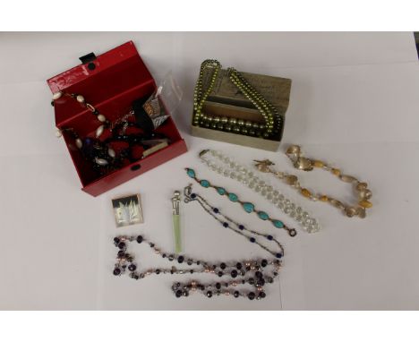 A Lancome box with crystal necklace and matching screw earrings, Arabian rose metal bracelet, watch links 0.5 grams approx go