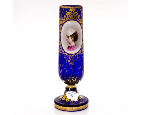 A Bohemian glass blue pedestal vase, gilt floral decoration with Continental hand painted porcelain oval plaque, portrait of 