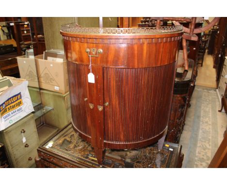 A 19th Century mahogany demilune tambour bow fronted cabinet with a brass galleried edge to top, complete with a single drawe