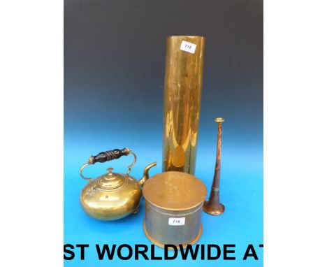 A large brass WW1 artillery shell case, a trench art casket made from an even larger shell, brass teapot etc 