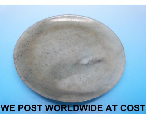 A small Chinese pale celadon jade snuff dish and spoon, probably 18thC (9cm diameter) 
