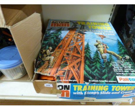 An Action Man training tower with escape slide and crane (in original box) together with various Action Man vehicles and acce