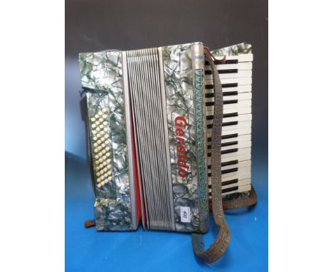 A 48 bass grey pearloid Geraldo piano accordion (in case)