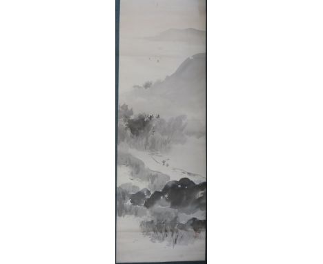 A Chinese scroll picture of a landscape scene, ink on silk with inscription and seal (40cm x 129cm)