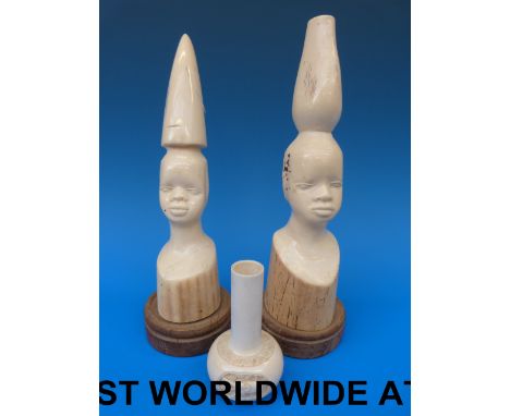 Two African carved ivory busts, a small ivory vase and a Chinese lacquer box 