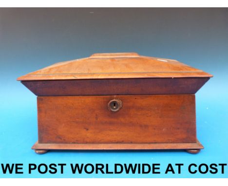 A 19thC mahogany sarcophagus-shaped tea caddy