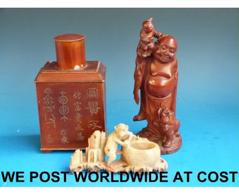 A 19thC / 20thC carved wooden Chinese figure, a Pak Tong tea caddy and a soapstone figural brush washer 