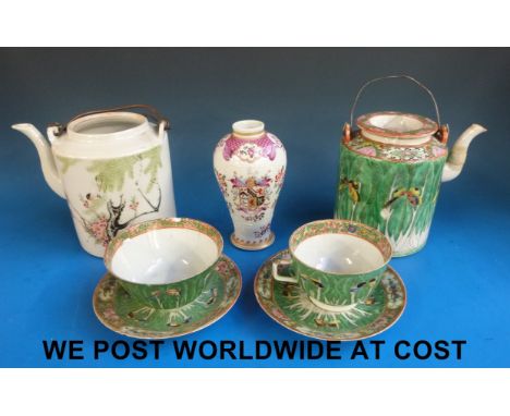 A Chinese Canton famille rose tea pot with two cups and saucers another tea pot and a Samson vase