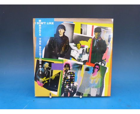BOOMTOWN RATS & Bob Geldof.  21 singles all in mint condition.  Includes a yellow flexi-disc; clear vinyl "Advance Free Ticke