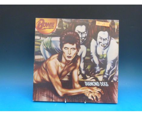 Eleven DAVID BOWIE and Bowie-related records.  Four DAVID BOWIE LPs: "Diamond Dogs" (First pressing, NM vinyl); "Heroes"; "Lo
