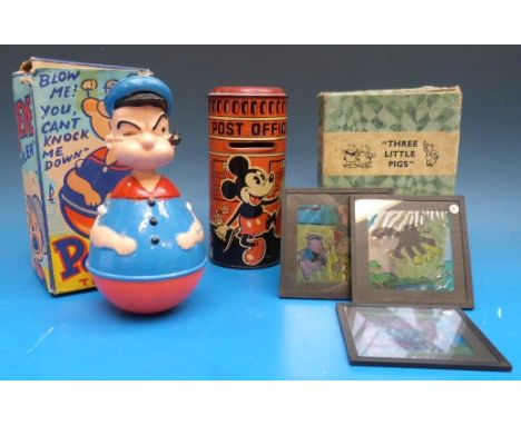 A set of 24 Walt Disney Mickey Mouse Ltd "Three Little Pigs" coloured lantern slides (in original box) together with a Popeye
