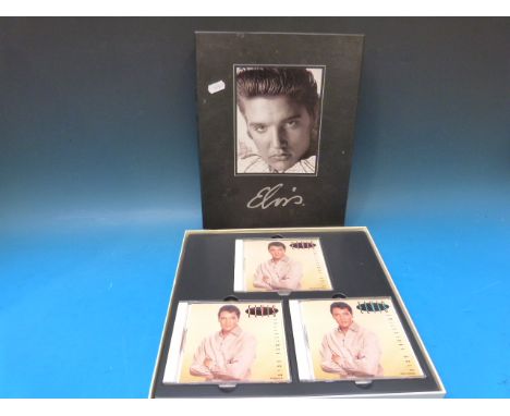 Four Elvis Presley boxed CD sets together with various ephemera